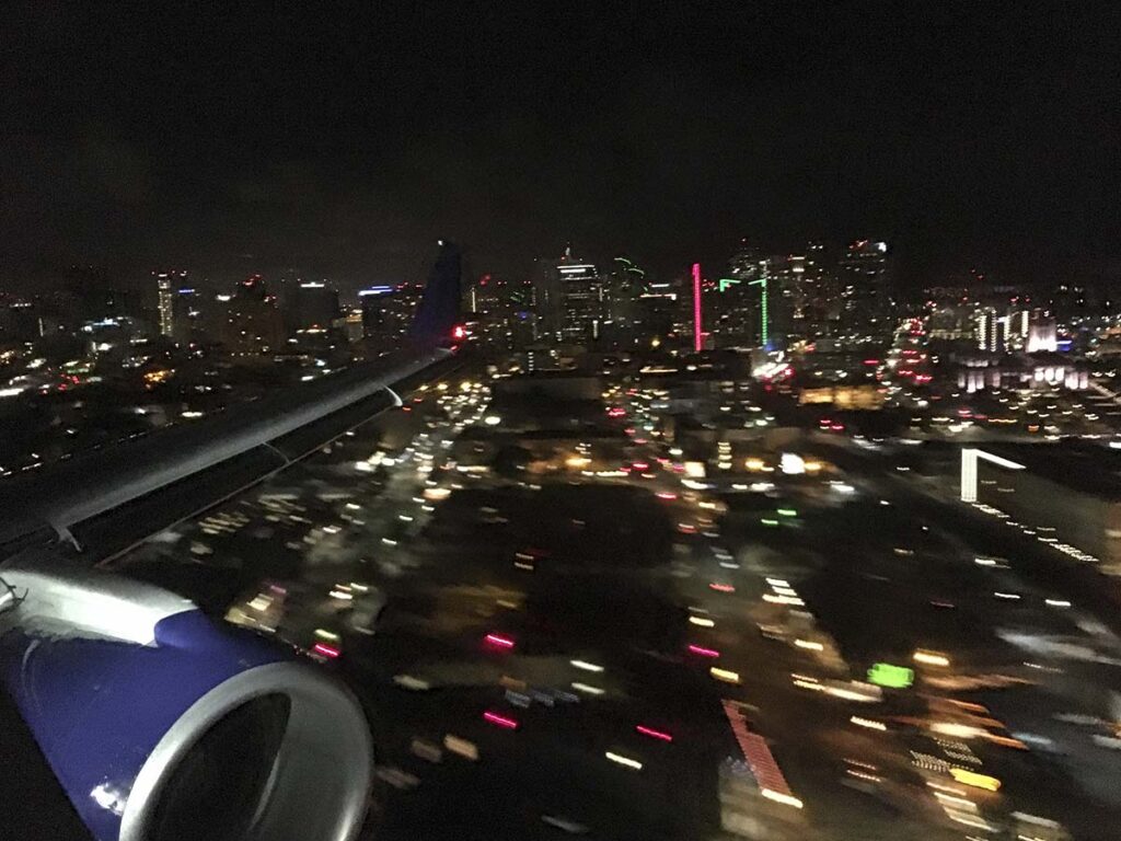 Flying over downtown San Diego at night on approach to SAN