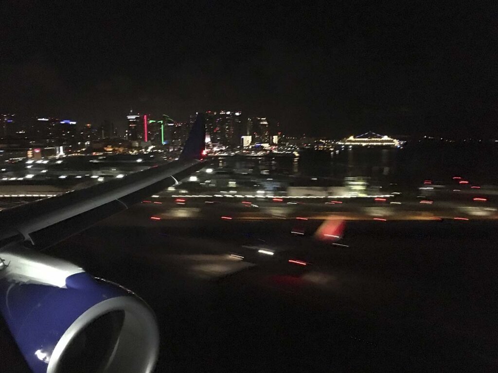 Short final for runway 27 at SAN at night