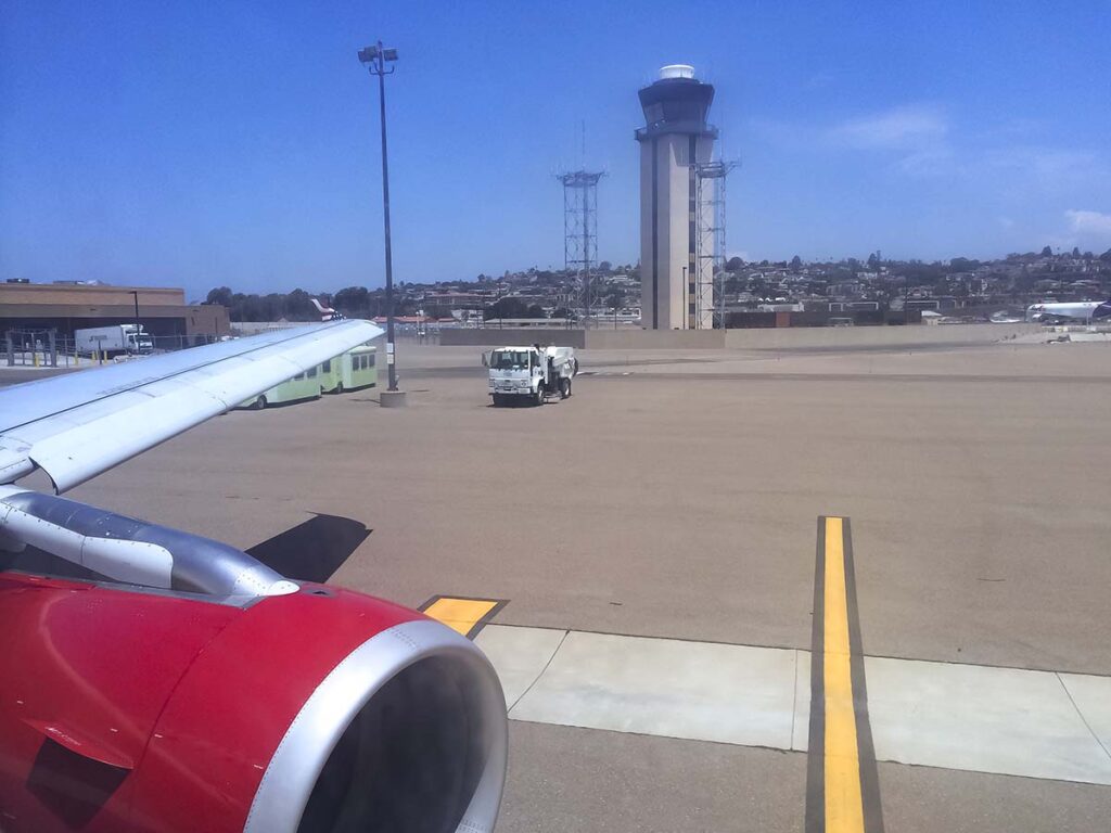 Virgin America A319 taxiing past the control tower San Diego airport