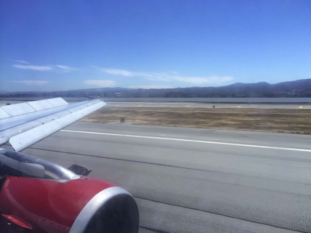 Virgin America A319 touching down on runway 28R SFO