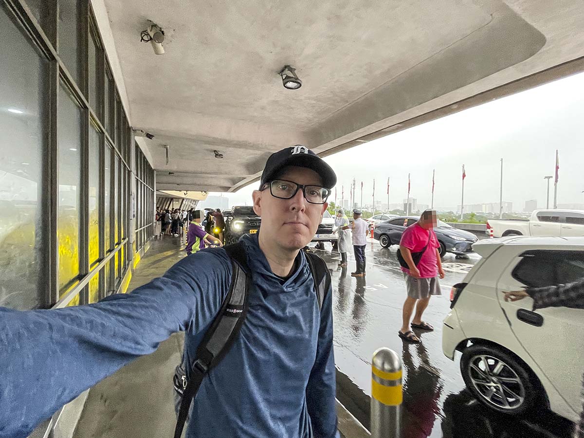 Scott walking into terminal 1 manila airport
