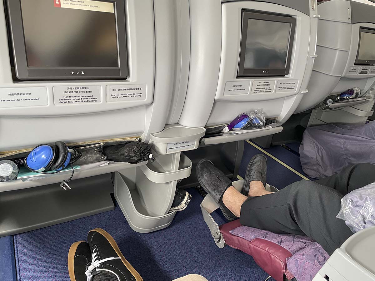 China Airlines A330-300 business class demonstration of the integrated leg rest and foot rest
