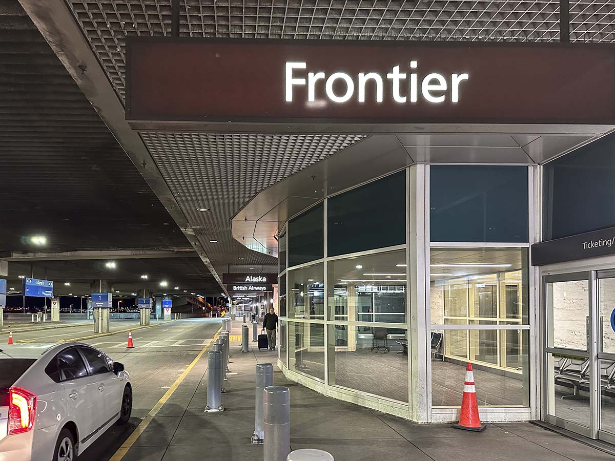 Frontier Airlines entrance Denver International Airport departures level