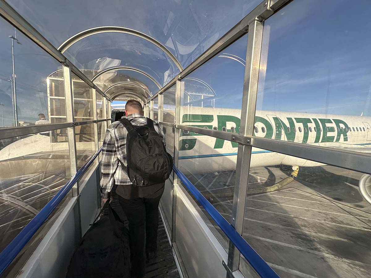 Boarding a frontier airlines A321 via covered stairs at the Denver International Airport