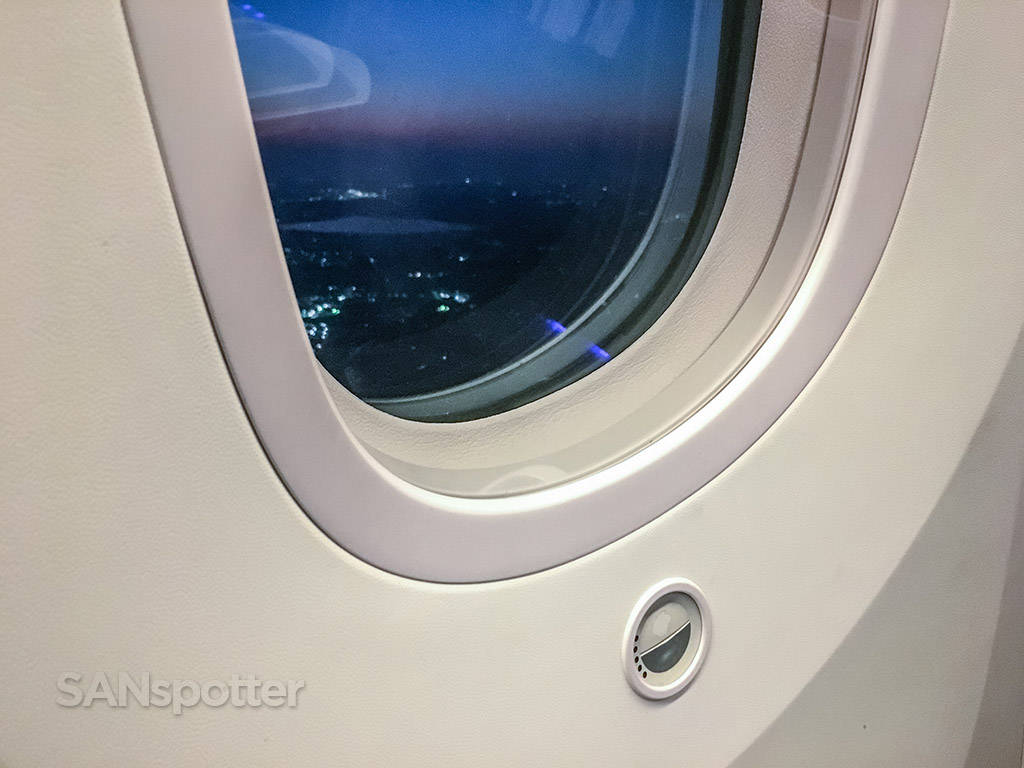 Looking out the window of a Japan airlines 787-8 while rolling down the runway for takeoff at Narita airport